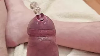 Beads string cock sounding into bladder
