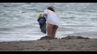 My Wife, a Beautiful 58-year-old on the Beach, Shows off and Masturbates with Hers
