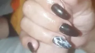 Jerking off my husband's cock nicely