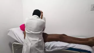 The doctor gives his patient a massage to relieve stress