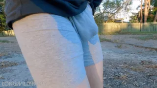 Straight guy goes out in public with tight grey boxer shorts with his package on show.