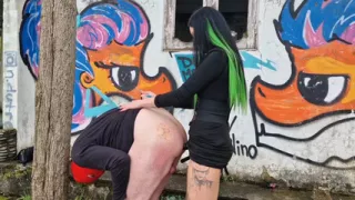 Dominatrix Nika put slave in doggy style and fucked him in the ass. Pegging on the street