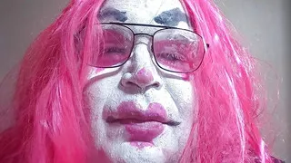 TV clown slut plays with her breasts for you