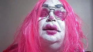 TV clown slut smoking a cigarillo and talking dirty