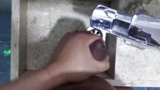 I jerk off in the hotel bathroom sink.