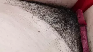 Amateur wife fingers her pussy until she reaches orgasm. Latina hairy pussy, big ass, big tits. Horny MILF