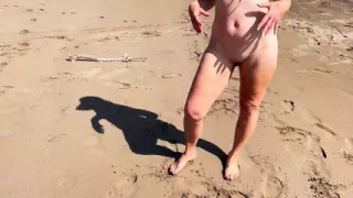 Dominant woman having fun on the beach