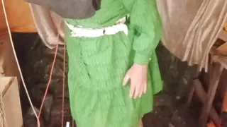 Green housewife with rubber head