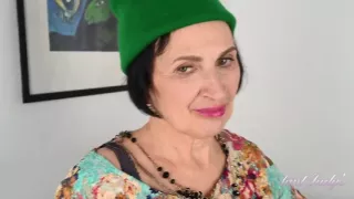 Minia Sniffs A Rose From Her Garden and Masturbates in Lacy Black Stockings