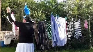 In attire with a schoolgirl dress to gather laundry and for an evening out.