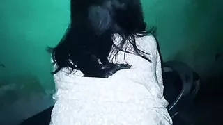 Riding a motorcycle in a narrow alley in the middle of the street