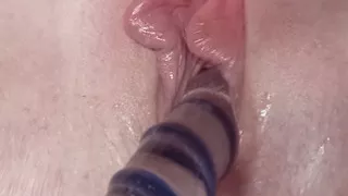 Granny with a big clit and wet pussy has an intense orgasm