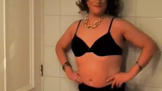 Crossdresser Fernanda Gomez in Front of Mirror