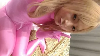 A cross-dressing boy changed from black full-body tights to pink full-body tights and masturbated.