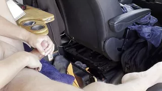 Alone at a large park and empty parking lot except for two cars