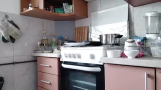 Sexy naked wife preparing food in the kitchen. Hairy brunette pussy, big ass, big tits.