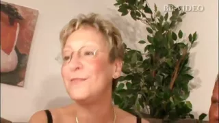 Blonde old MILF loves to fill her holes with two cocks deep inside her throat and pussy in a threesome