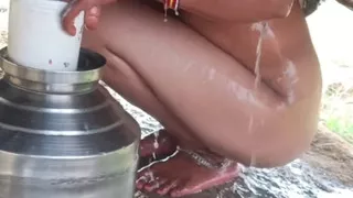 Desi bhabhi outdoor bathing India
