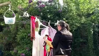 In attire with a little leopard skirt for a day and to hang the laundry.