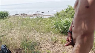Nude and masturbate in a seaside public area