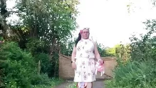 In an outfit with a new summer dress for an evening