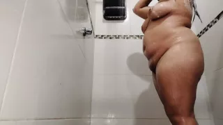 Watching my busty Colombian stepmom bathe and touch herself at the same time is very exciting.