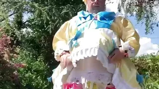 In an outfit with a yellow and blue maid dress for a day.