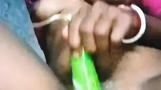 Asian house wife self satisfaction with brinjal and her pussy orgasm squirting her with brinjal