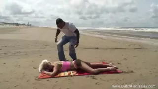 Blonde milf with big tits is riding dude's cock in the car