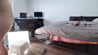 The sexy mom likes to try on clothes and cut them.