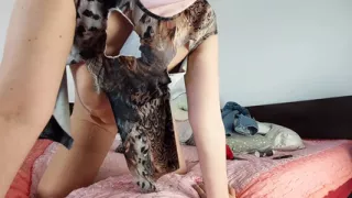 Amateur wife has fun trying on clothes that she tears.