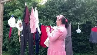 In an outfit with a little pink button dress to go pick up my laundry.