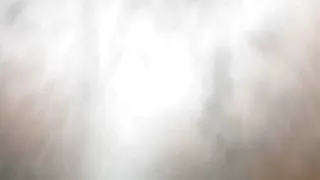 Flashing his big black ass.