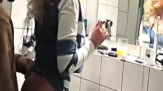 German blonde in white stockings fucked in the bathroom