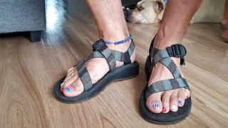 Changing sandals on my cute, pedicured feet