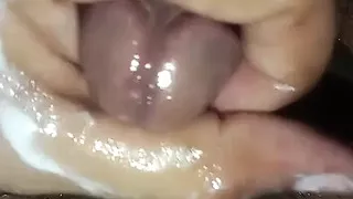 A Close-up on My Cock's Oiled Head