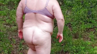 neighbor undressed in a public park and masturbates her pussy