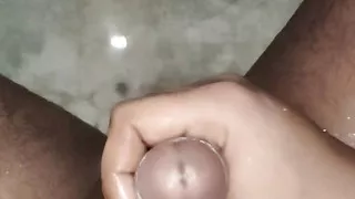 Horny Indian gay doing masterbate in bathroom and releasing thicky salty sperm