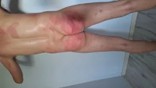 Dominatrix with big tits. Femdom she beats him with a belt 30times and he must count, pisses on him and makes him lick the cum.