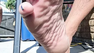 Showing off my wet feet and hairy legs