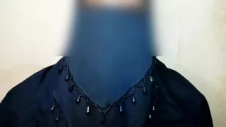 A burqa-clad girl from Saudi Arabia comes to the house to fuck for money.