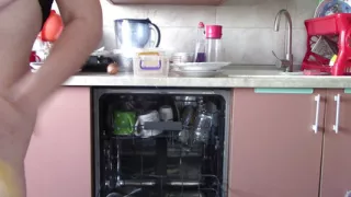 Sexy naked wife preparing food in the kitchen. Hairy brunette hair, big ass, big tits.