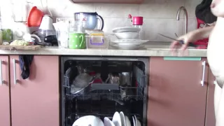 Naked sexy wife preparing food in the kitchen. Hairy brown hair, big ass, big tits.