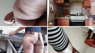 Sexy naked wife preparing food in the kitchen.