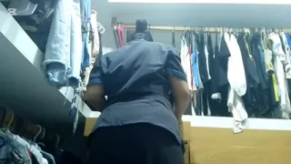 MILF maid masturbates her big ass in her boss's locker room while he works