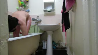 Beautiful lady in the bathroom. With conversations in Russian