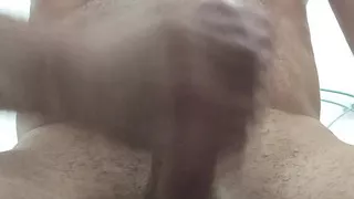 Posing with cock in hand