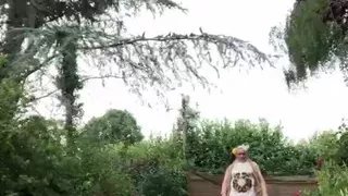 In an outfit with a little white dress featuring a horse pattern for an evening event.