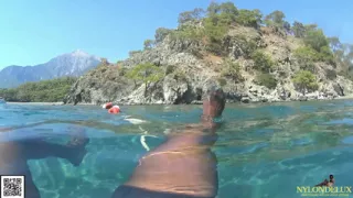 Peniscage&stocking in the public sea