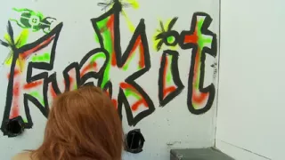 Redhead with big tits sucks dick through a glory hole